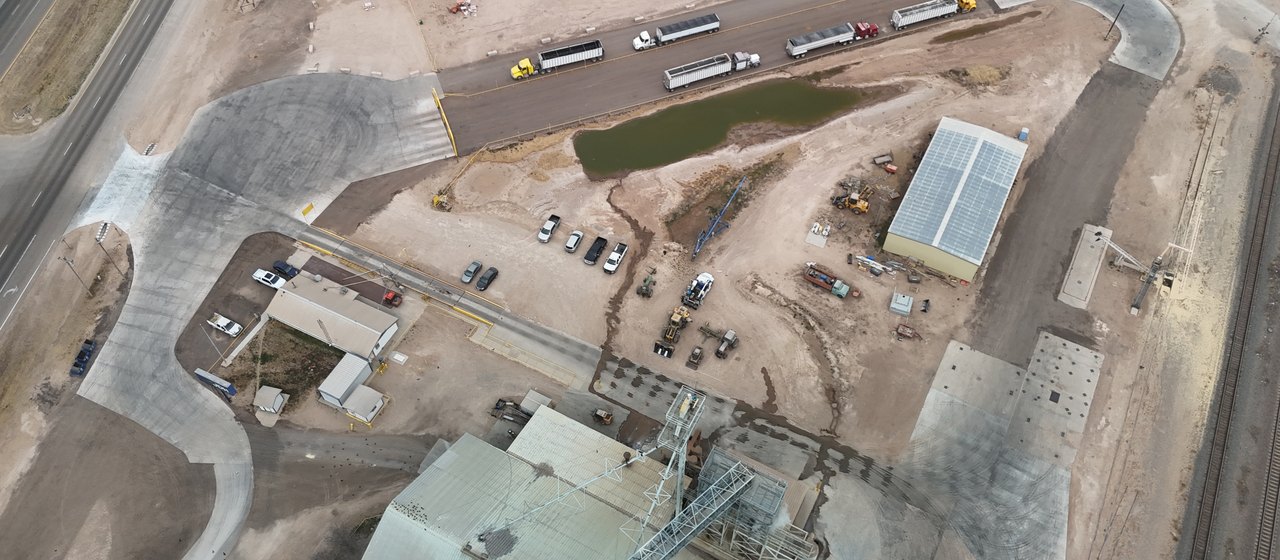 Aerial view of a completed Bermea Construction facility site with paved drives and approaches