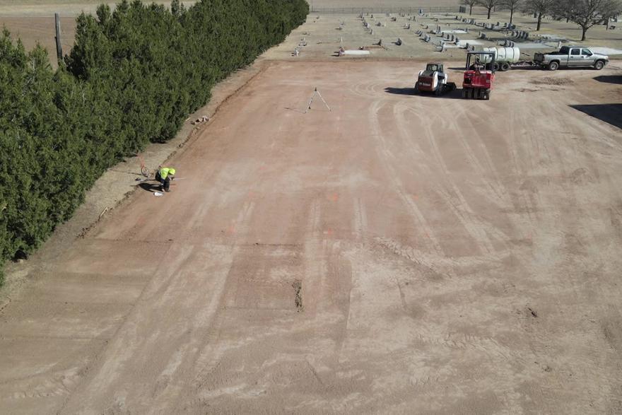 Aerial view of a large site being graded and shaped